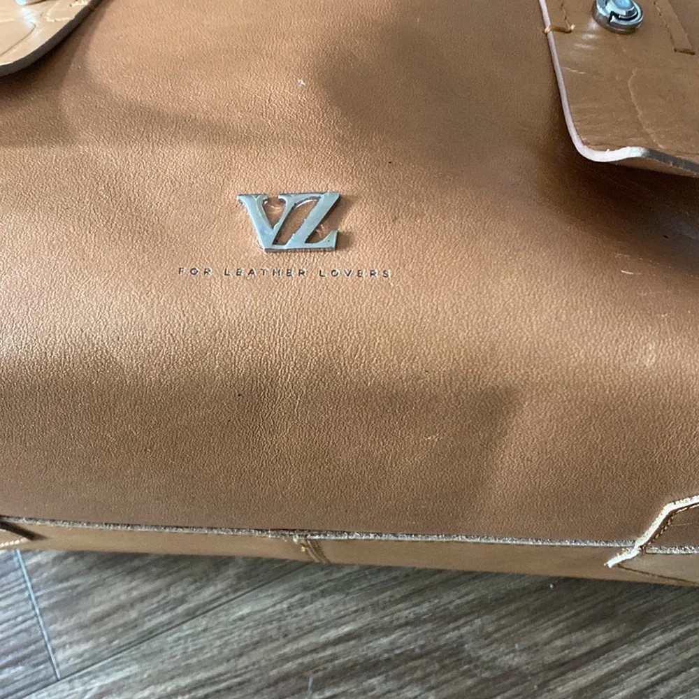 New with tags inside Leather Velez Columbia satchel w/crossbody strap Camel